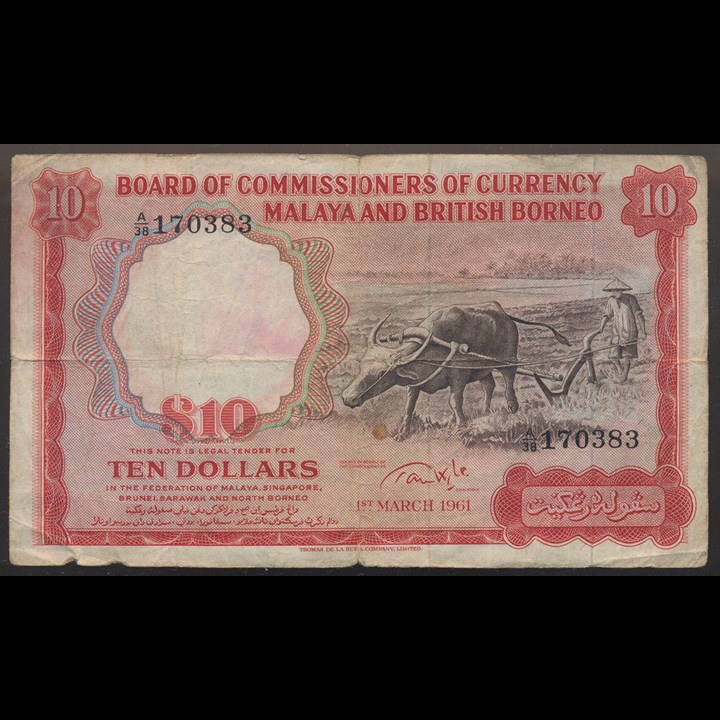 Malaya and British Borneo 10 Dollars 1961 VG/F, small tears/ink writing